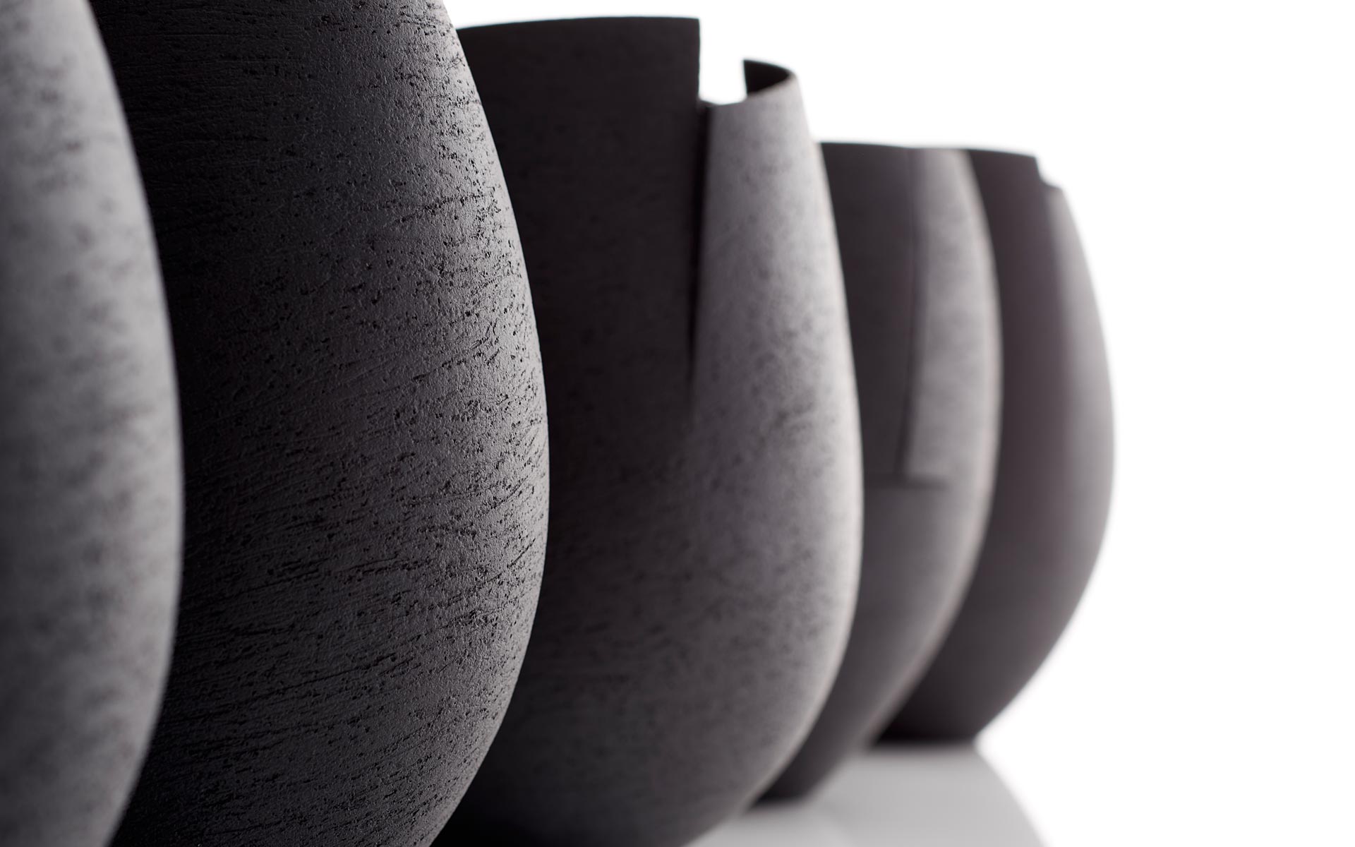 Group of small black cut vessels - Detail