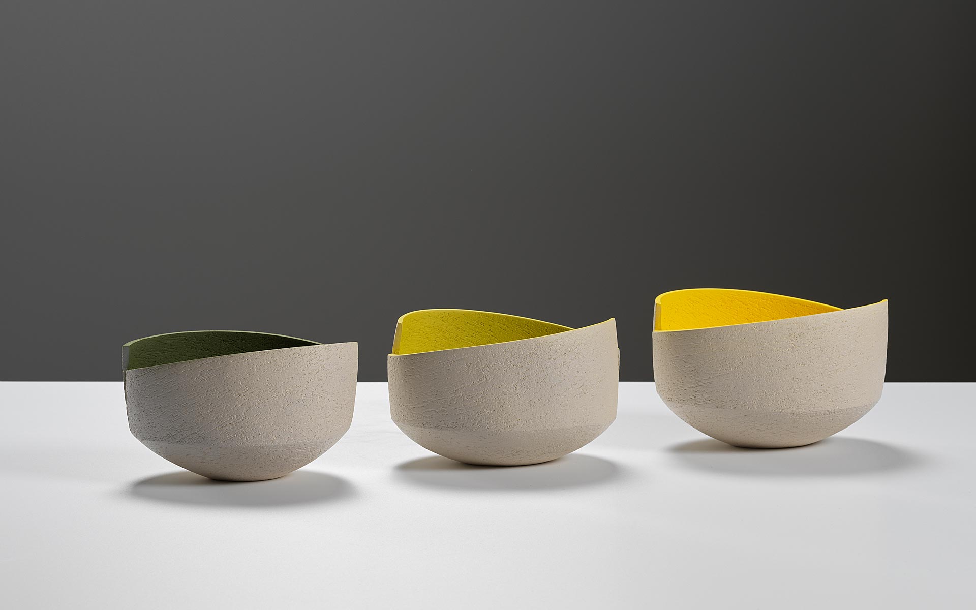 Group of cut and altered bowls
