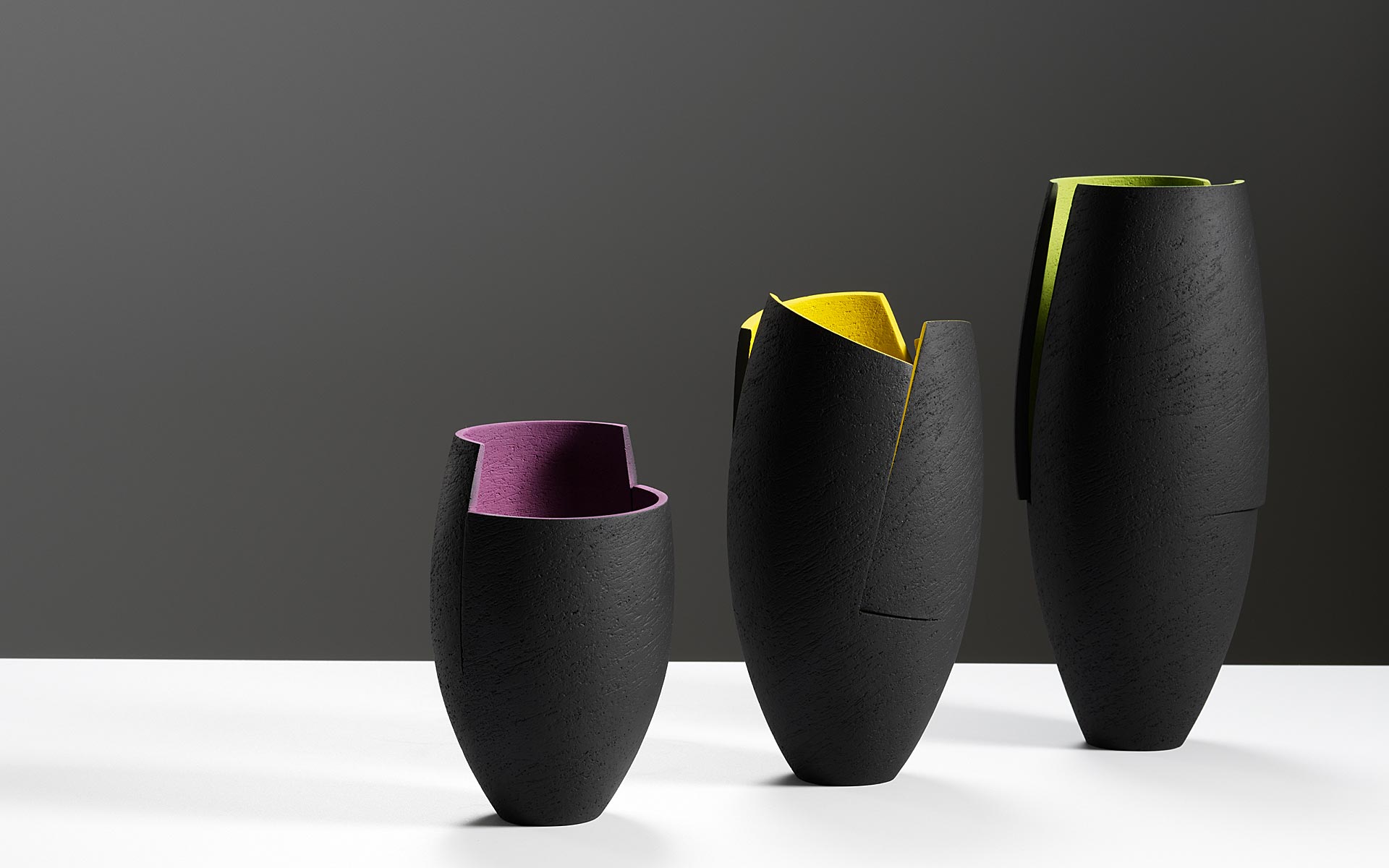 Group of cut and altered vessels with colours