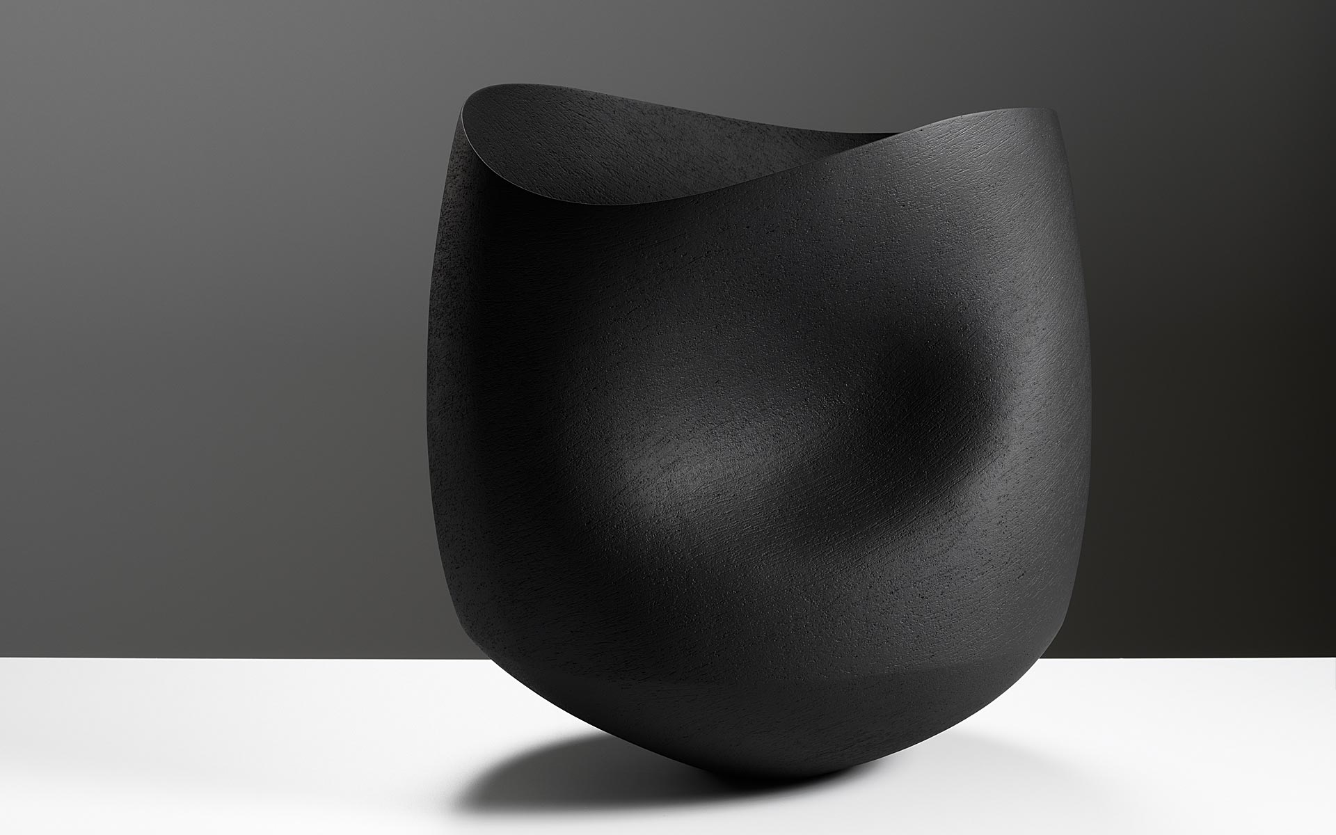 Large undulating black bowl