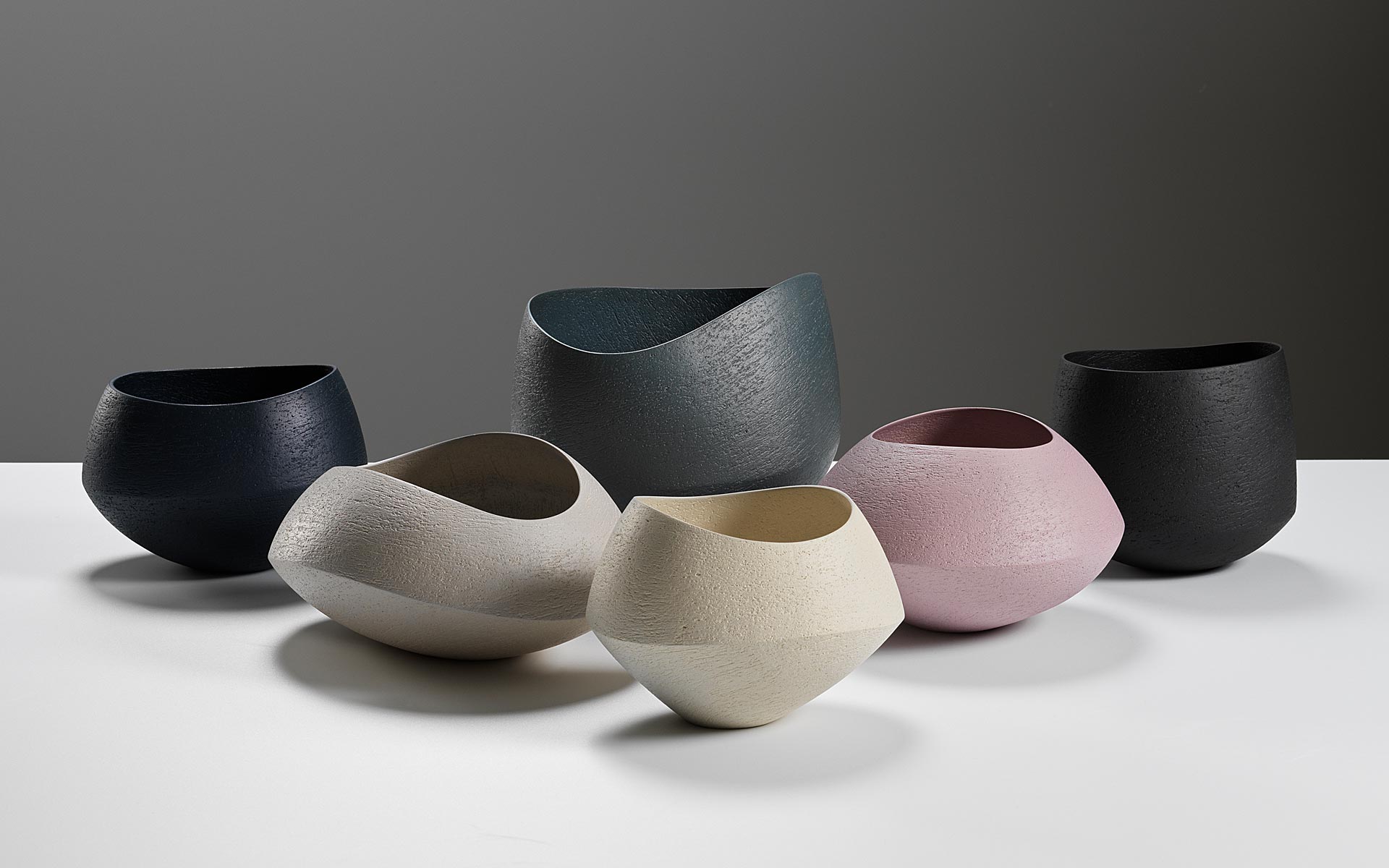 Group of undulating bowls